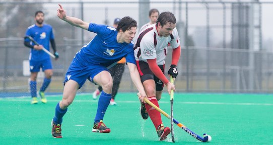 Christopher Lee playing field hockey